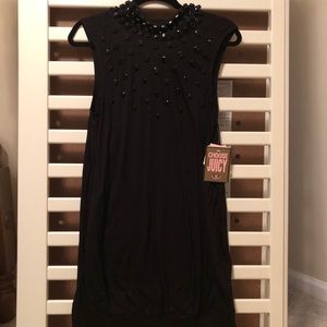Black short dress. Never worn. Medium.